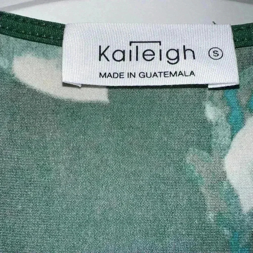 Kaileigh green, long sleeve floral dress
￼ - Picture 2 of 3